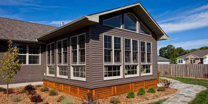 Exterior shot of a brand new sun room home addition.