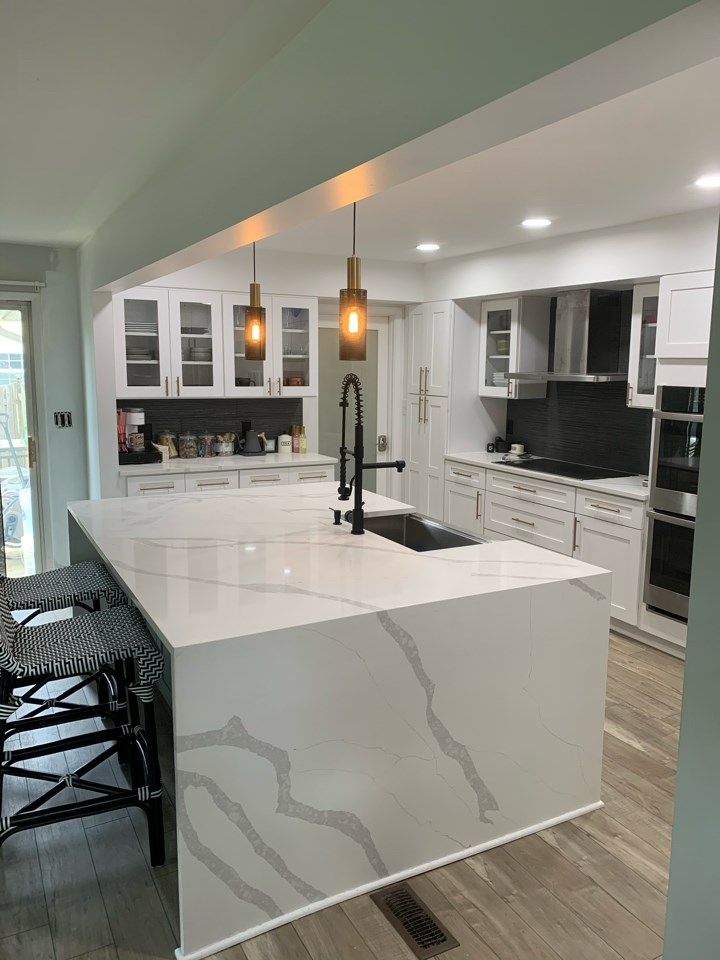 Kitchen remodeling with large white kitchen island