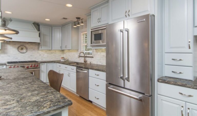 modern remodeled kitchen with stainless steel fridge